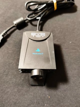 Disney Move + Cámara EyeToy. PlayStation 2.