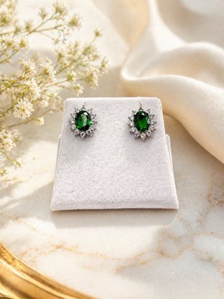 Orecchini acciaio con strass verdi