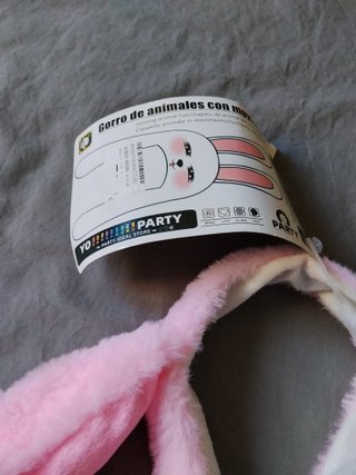 Diadema rosa las orejas se levantan