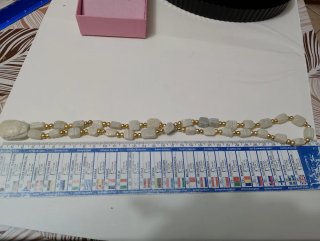 Collana amuleto scarabeo oro bianco