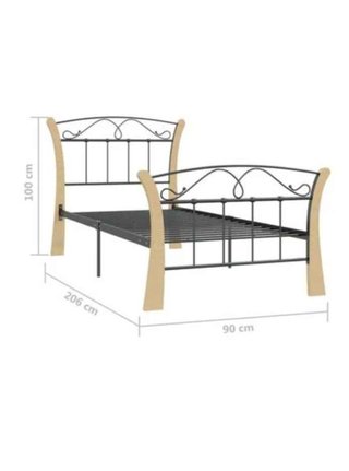 Cama individual metálica con detalles de madera