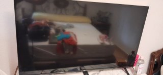 Televisor TCL Negro y Plateado