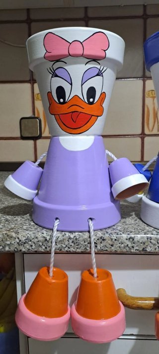 Muñecos de macetas Donald y Daisy