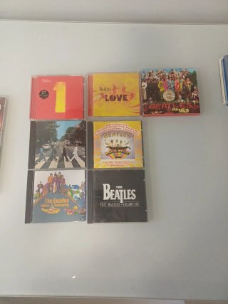 CDs The Beatles: 1, Love, Sgt. Pepper's