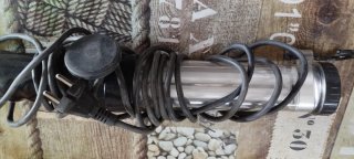 Lámpara portátil con cable y enchufe