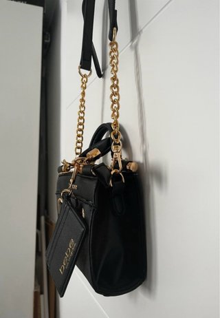 Bolso Bebe Negro con Tarjetero Dorado