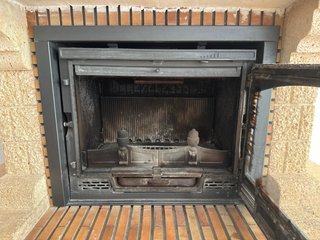 Chimenea de leña piedra y madera