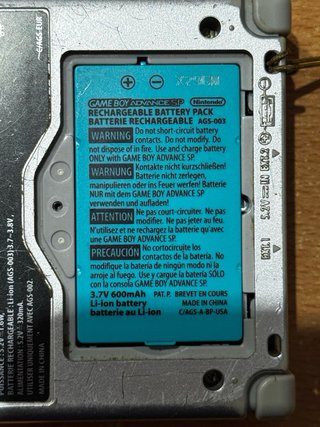 Game Boy Advance SP + Pokémon Esmeralda + Cargador