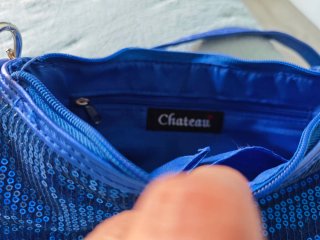Bolso de fiesta azul con lentejuelas