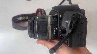 Canon 1000d+Lente 18-55+Tampa+ Fita+carregador