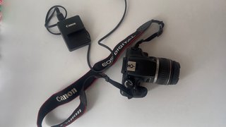 Canon 1000d+Lente 18-55+Tampa+ Fita+carregador