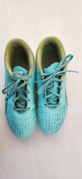 Botas de fútbol Puma Ultra verdes turquesa