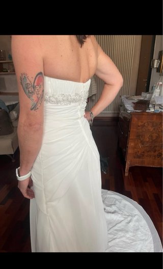 Abito da sposa bianco.