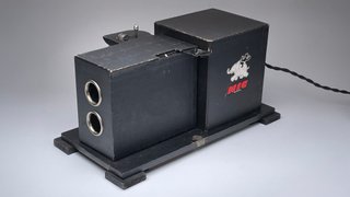 Proyector Cine NIC 1931 + 31 Películas