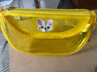 Bolso transparente amarillo con dibujo