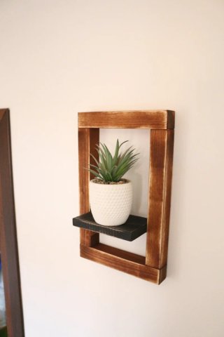 Mensola decorativa in legno marrone e nero