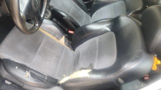 Asientos de coche de cuero y tela