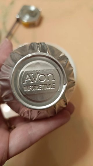 Candela vintage Avon porcellana