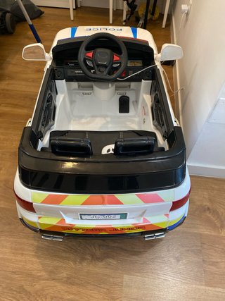 Coche eléctrico policía niños