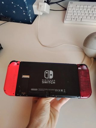 Nintendo Switch con 3 juegos y conectador HDMI