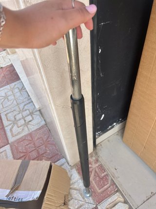 Barra metálica ajustable