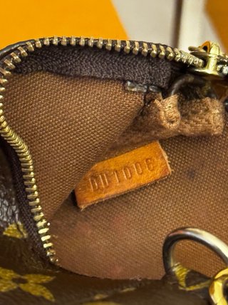 Pochette Louis Vuitton monogram marrone
