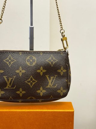 Pochette Louis Vuitton monogram marrone