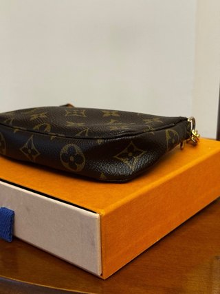 Pochette Louis Vuitton monogram marrone