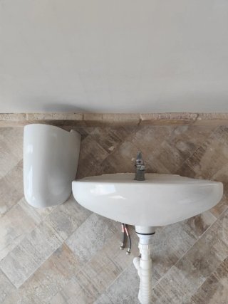 Lavabo de cerámica blanco
