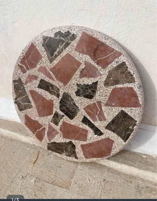 Mesa redonda de mármol