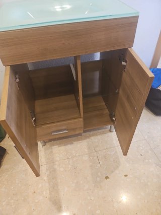 Mueble de baño con lavabo de cristal