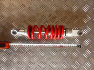 Amortiguador de moto rojo