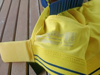 Sujetador deportivo Shock Absorber azul/amarillo