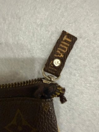 Pochette Louis Vuitton monogram marrone