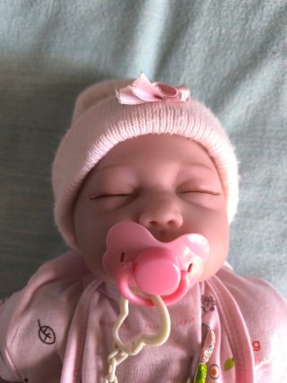 Muñeca Reborn con Ropita y Maletín