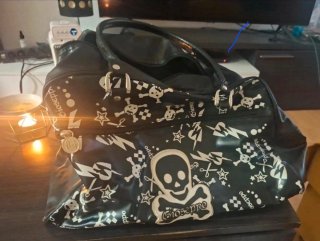 Bolso de viaje Gioseppo estampado calaveras