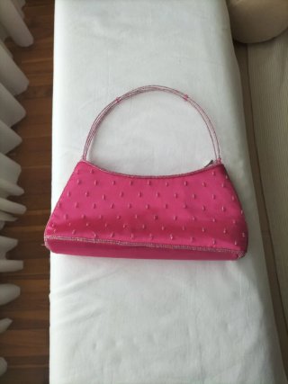 Bolso de fiesta rosa con pedrería