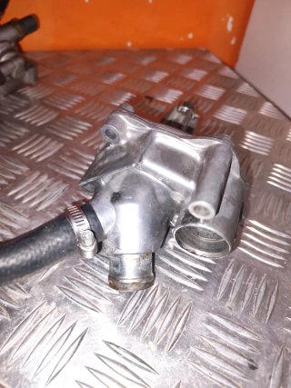 (000392)Bomba y termostato Honda PC40