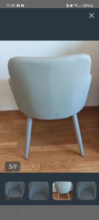 Silla gris polipiel acolchada. Nueva.