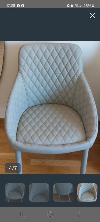 Silla gris polipiel acolchada. Nueva.