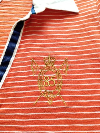 Polo rayas Tommy Hilfiger naranja y blanco
