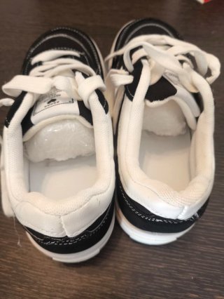 Sneakers nere e bianche per bambini