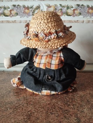 Muñeca musical de tela