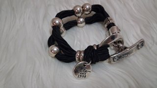 Pulsera Ciclón de cuero y bañada en plata