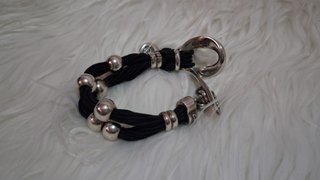 Pulsera Ciclón de cuero y bañada en plata