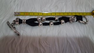 Pulsera Ciclón de cuero y bañada en plata