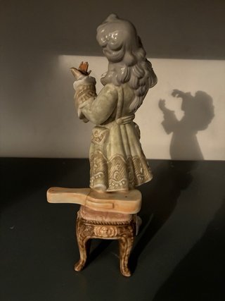 Figura de porcelana músico barroco