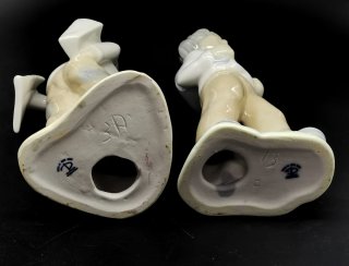 Bonita pareja de figuras Tengra niños estudiantes