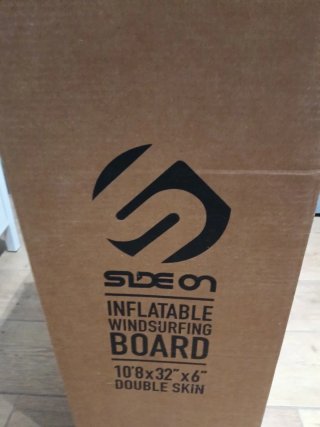 En su caja Paddle Surf SIDE ON 10.8x32 + windsurf