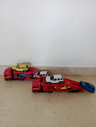 Lote de Camiones q llevan coches Juguete